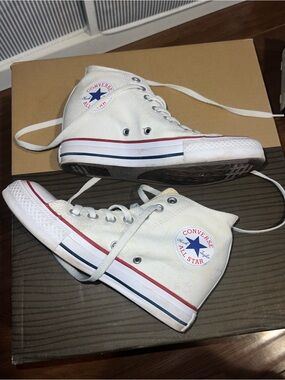 Converse Chuck Taylor All-Star wedges. Size 7 but fit like 7 1/2 -8 ish.